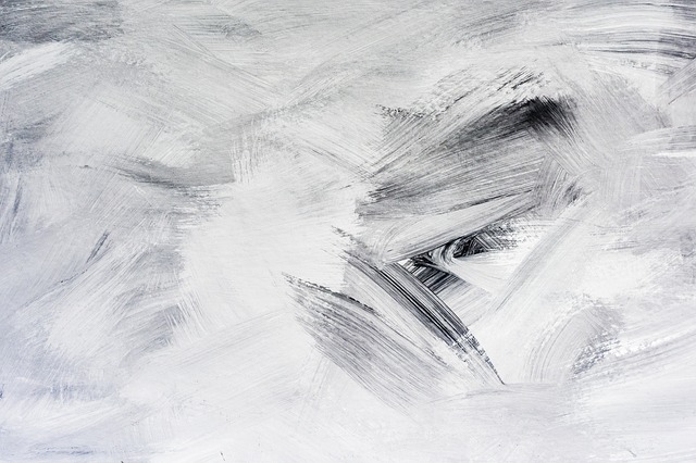 A painting with harsh white and black brush strokes, like a snowstorm